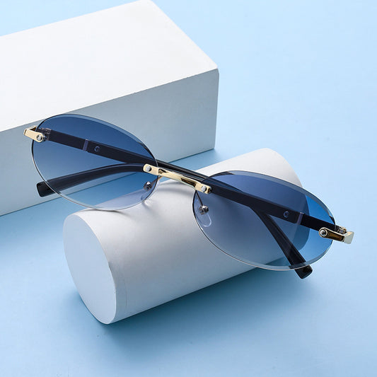 Trimming Oval Frame Sunglasses Frameless Hot Girl Sunglasses O1CN01qdrJt42ND59tQOzah  2217885979928 0 cib