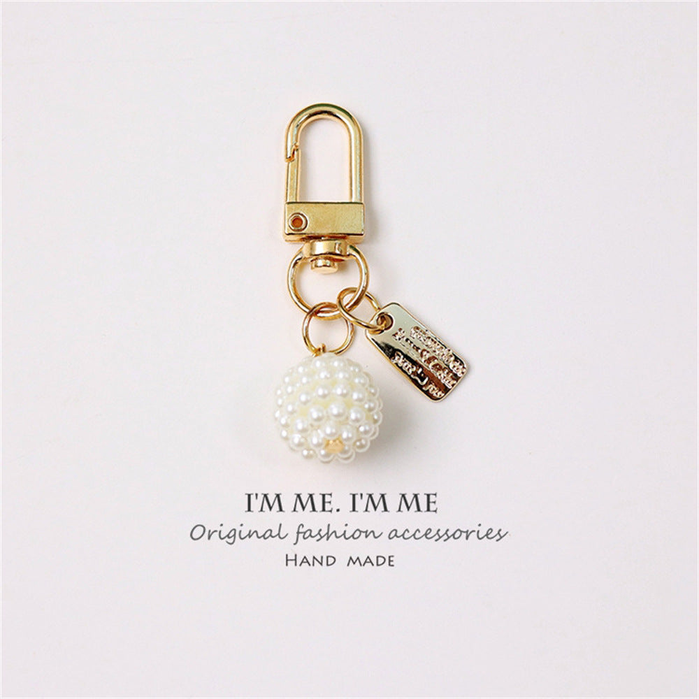 Cross-border Rose Bow Pearl Tassel Key Chain Car Pedant Decoration O1CN01smW7q029U7AjjMrFH  2217109788070 0 cib