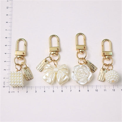 Cross-border Rose Bow Pearl Tassel Key Chain Car Pedant Decoration O1CN01t5U7hq29U7Aipz87f  2217109788070 0 cib