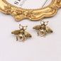 Pearl Retro Little Bee Ear Studs O1CN01xmT1Ua2AX9Lkdz0n2  2215690308212 0 cib