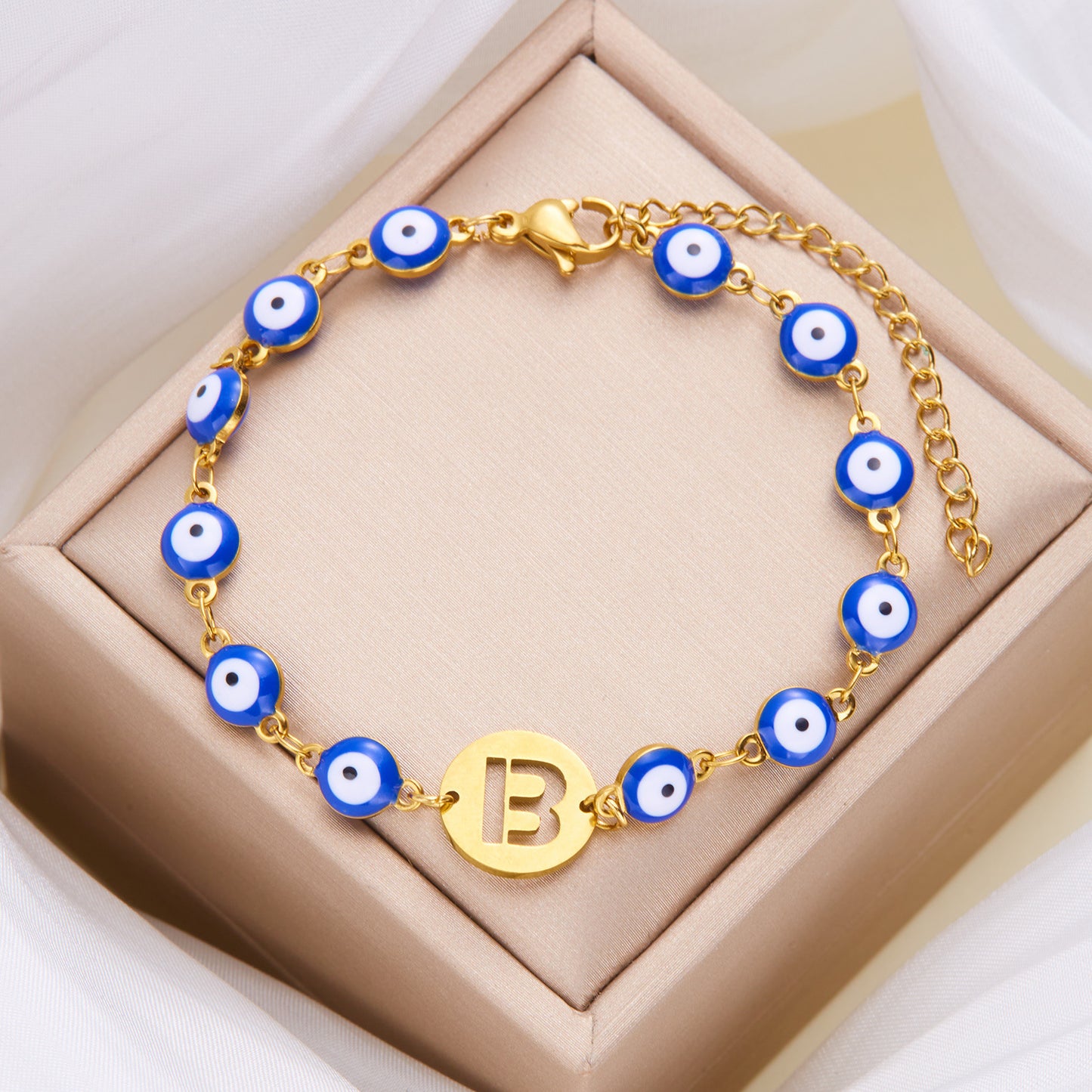 Women's High-grade Stainless Steel Blue Eyes Fashion Hollowed-out 26 Letter Bracelet a8b3871c c55f 4230 9f1a b1d72e38a0ca