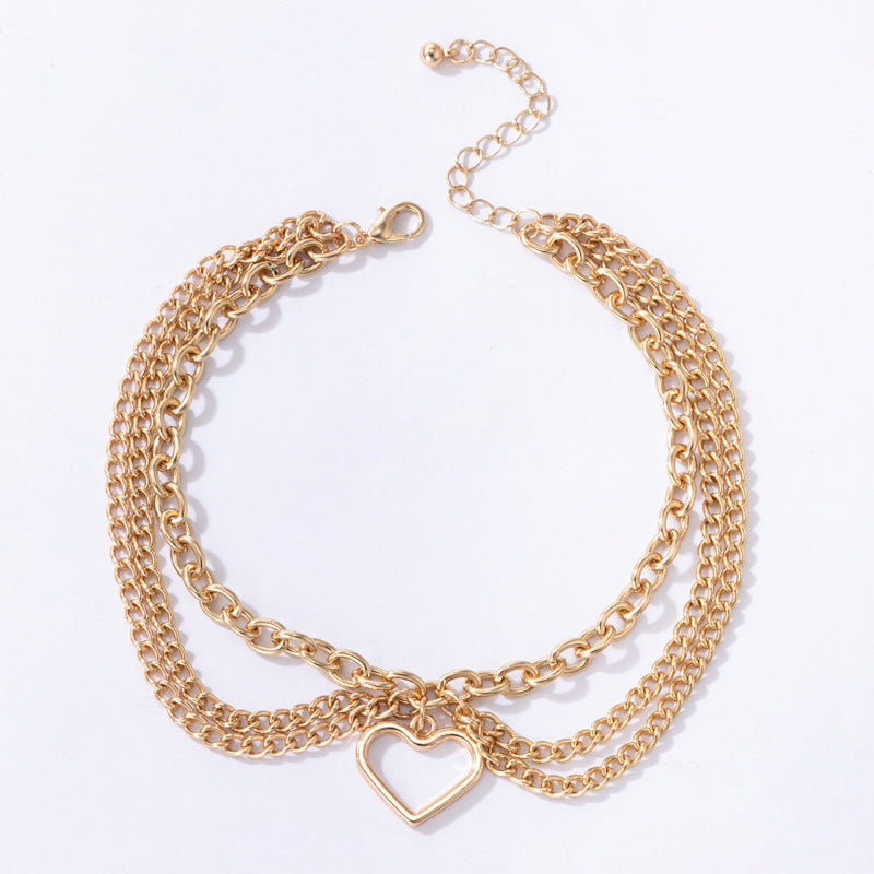 Gold Heart-shaped Chain Foot Ornaments Tassel Snake Pendant Three-layer Anklet For Women ac6af575 77bc 4a85 a401 7a2d7b4b021f