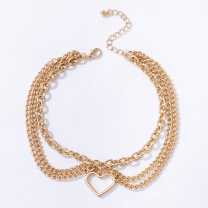Gold Heart-shaped Chain Foot Ornaments Tassel Snake Pendant Three-layer Anklet For Women ac6af575 77bc 4a85 a401 7a2d7b4b021f