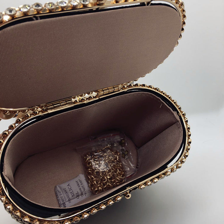 Hollow Pearl Buckle Birdcage Clutch adbb8687 bb3a 4fa3 88a8 1c7625d89c1e