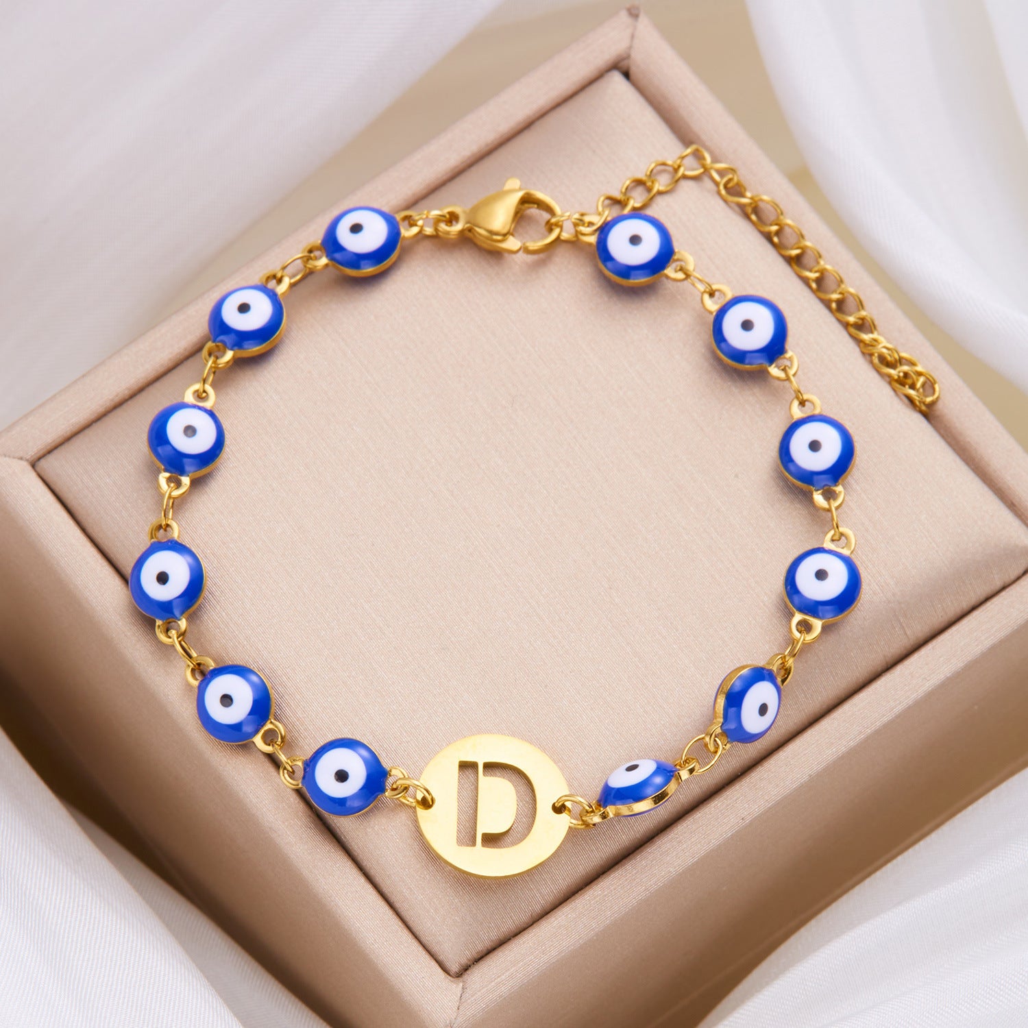 Women's High-grade Stainless Steel Blue Eyes Fashion Hollowed-out 26 Letter Bracelet b0563b9e 10f3 4bbb 96b5 3f2b3f0d64f3
