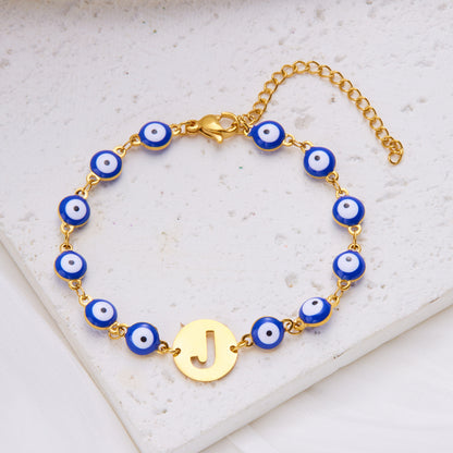 Women's High-grade Stainless Steel Blue Eyes Fashion Hollowed-out 26 Letter Bracelet bf8854a3 aa58 4d03 b237 06d6c6bf965a