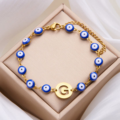 Women's High-grade Stainless Steel Blue Eyes Fashion Hollowed-out 26 Letter Bracelet c050e3c8 3e53 4b26 857c 9cef03caf5a4