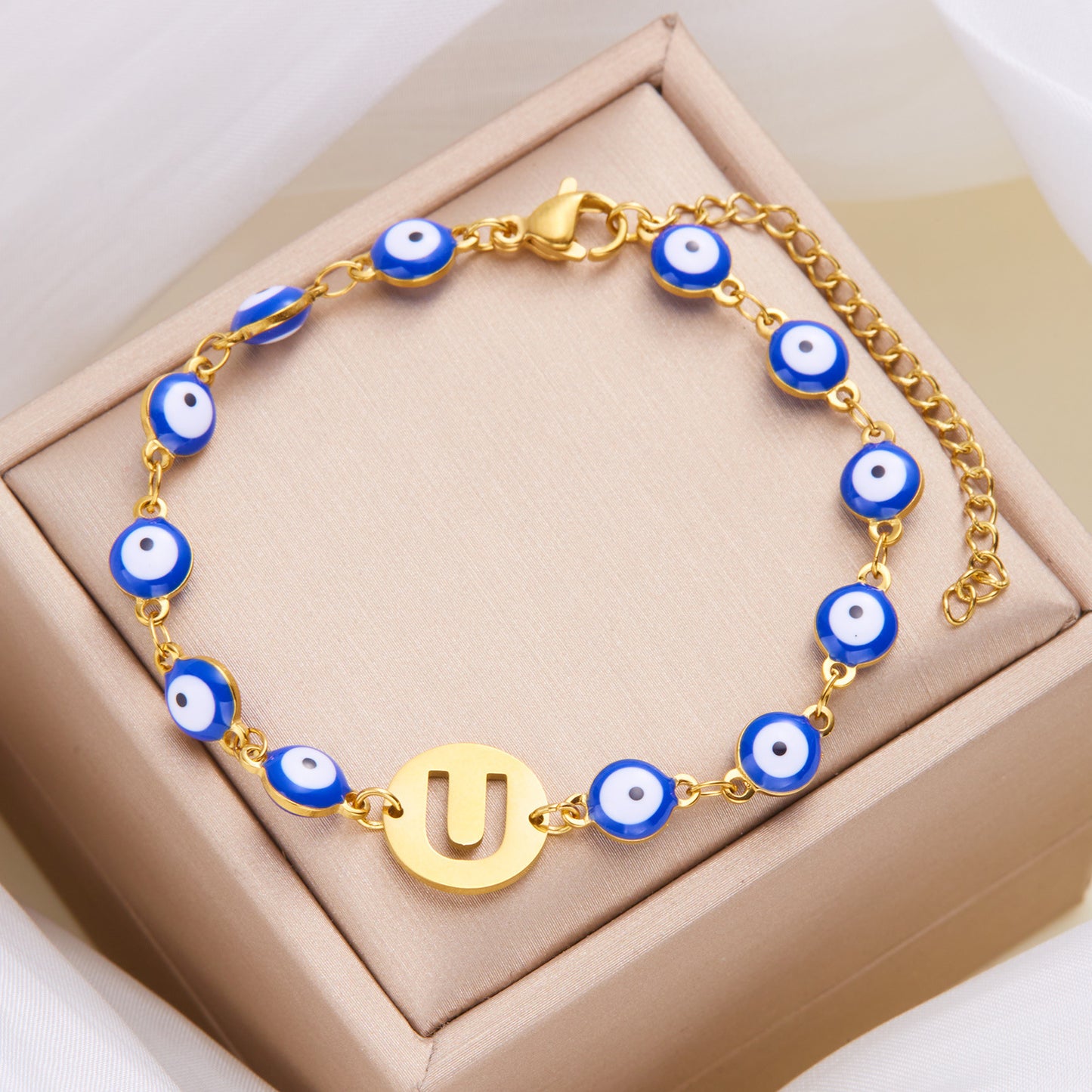 Women's High-grade Stainless Steel Blue Eyes Fashion Hollowed-out 26 Letter Bracelet cecfe769 101f 4d99 970d 4b58bffa206a