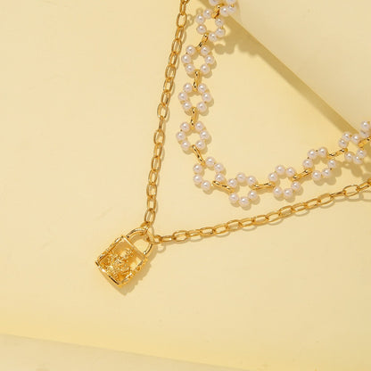 Vintage Embossed Lock Pendant Pearl Necklace d1180ff4 a7e5 42b1 aed9 a1b50159cc45