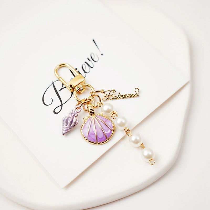 Lovely Pearl Shell Conch Key Chain Pendant d9fb6f2b 2c2a 4c15 9abe a14887bd5bfa