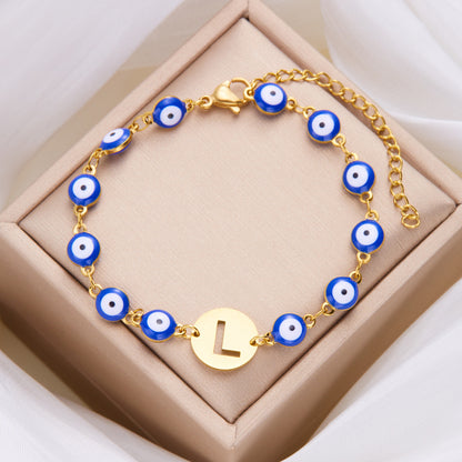 Women's High-grade Stainless Steel Blue Eyes Fashion Hollowed-out 26 Letter Bracelet ddd1c04d cd56 4dd5 bd82 7f388a3a131d