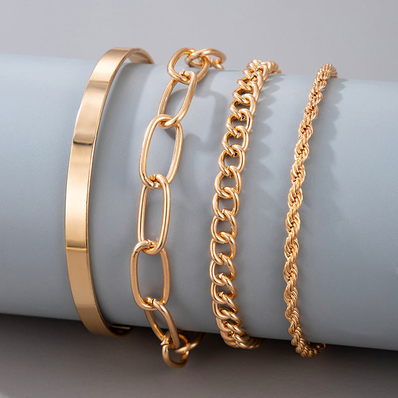 Exaggerated And Minimalist Gold Thick Chain Bracelet Set Of Four Pieces e1df1db6 7e82 4503 89c2 f2d27abcf0e2