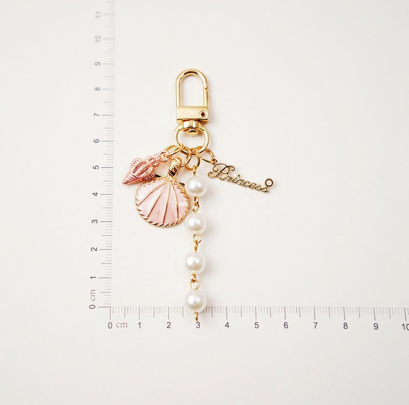 Lovely Pearl Shell Conch Key Chain Pendant f3cef34f 951c 4e44 9376 a8ef56d915ea