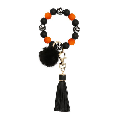 Silicone Wrist Keychain Handmade Beaded Leather Tassel Bracelet f9b9c35d 4cc5 4b70 bd78 3199de072bf1